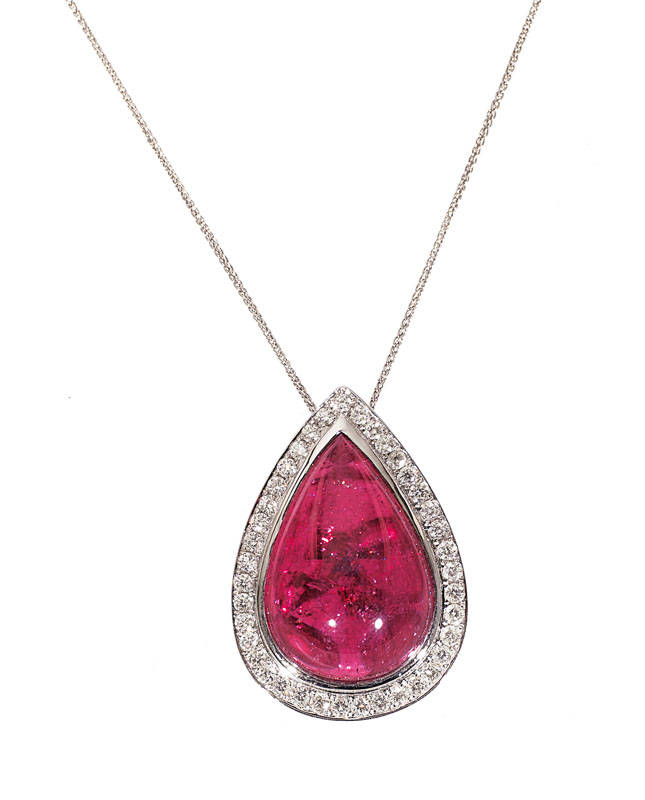 A pearshaped rubelith diamond pendant with necklace