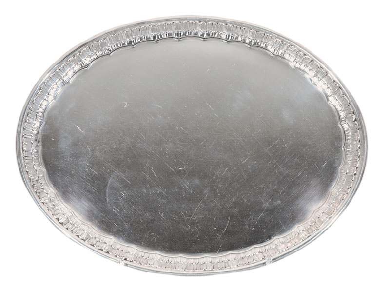 An oval tray with engraved frieze