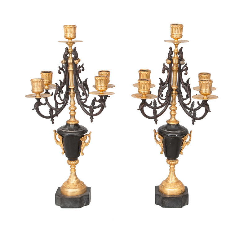 A pair of classical candle holders