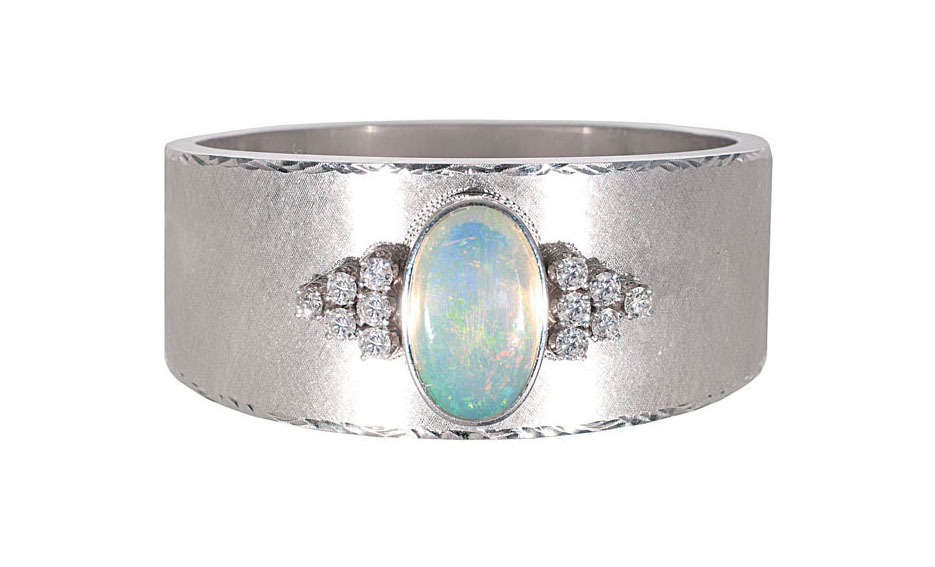 An opal diamond bangle bracelet