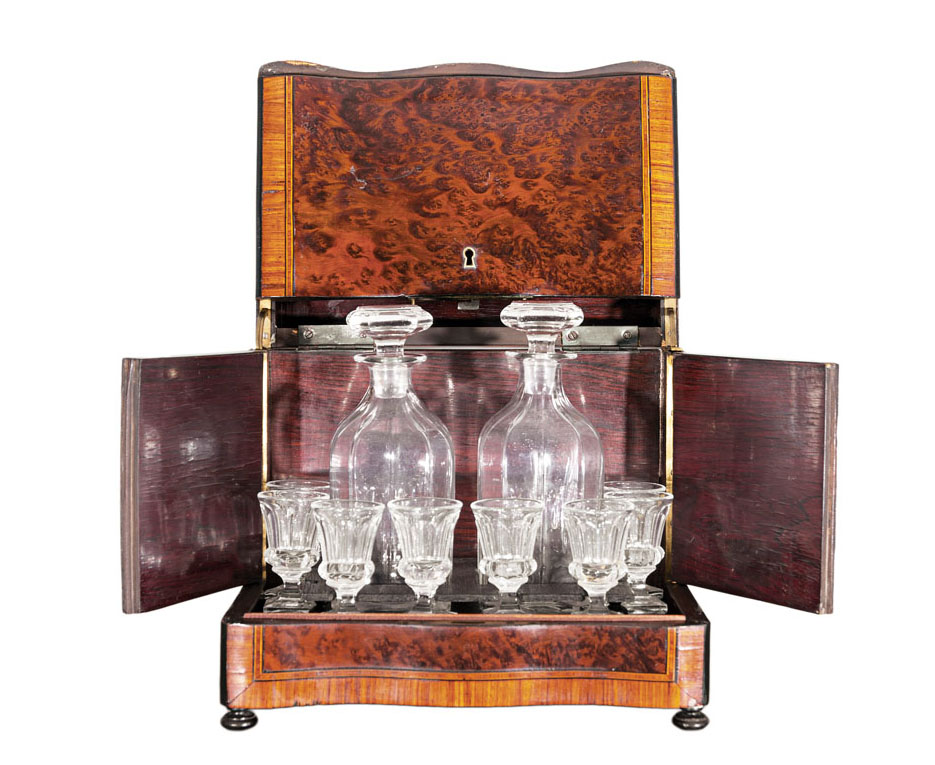 A liquor tantalus with fine marquetry