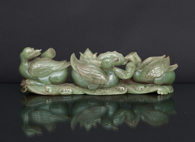 A fine celadon jade carving '3 ducks on a lotus pond'