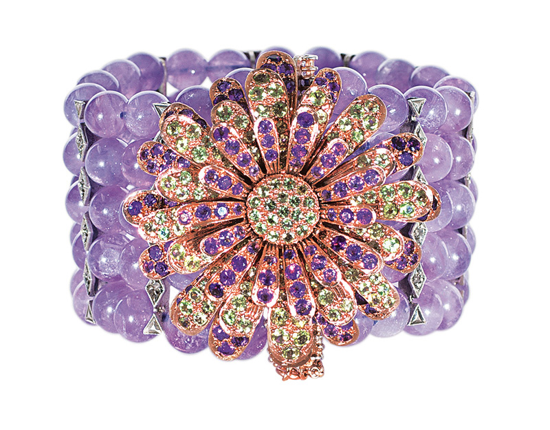 An amethyst peridot bracelet with splendid flowershaped clasp