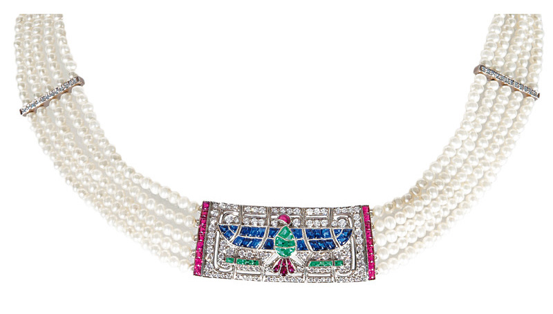 A pearl necklace with precious clasp 'Horus Hawk' in the style of Art-Déco