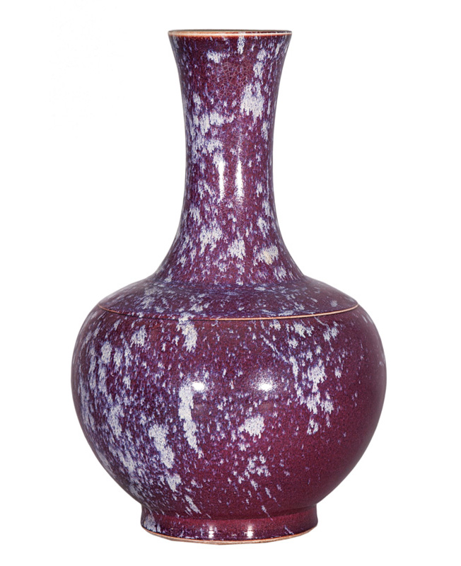 An unusual flambé bottle vase