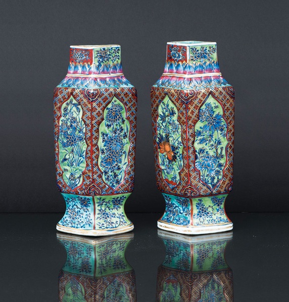 A pair of clobbered rhomb-shaped vases