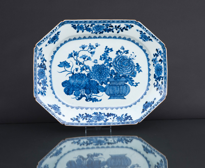 A large rectangular platter with flower vase