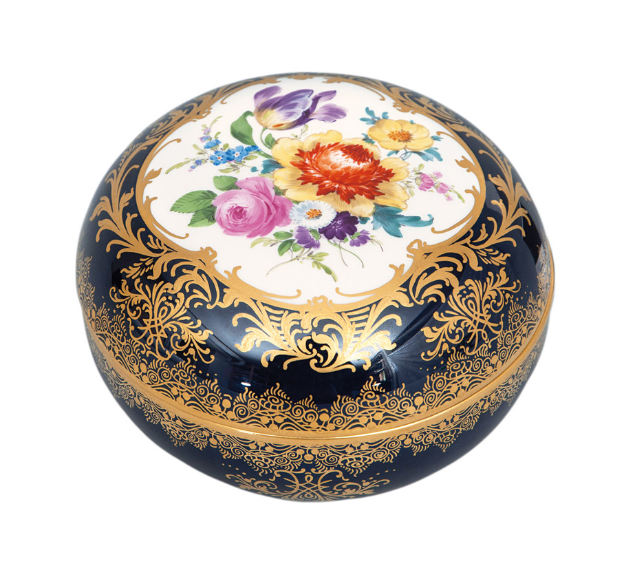 A cobalt-blue box with flower painting