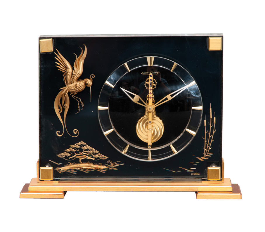 A table clock 'Paradise bird' of the serie 'Marina'