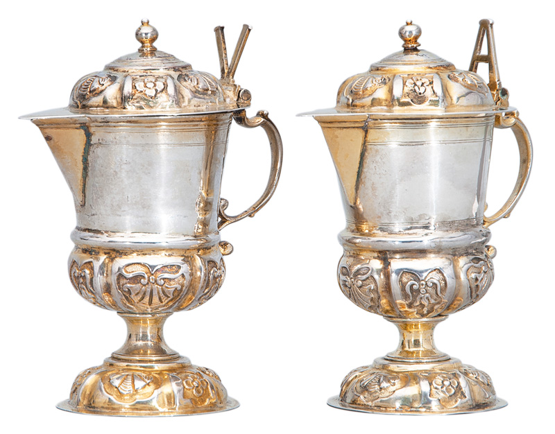 A pair of parcel-gild cruets 'Vino et Aqua'