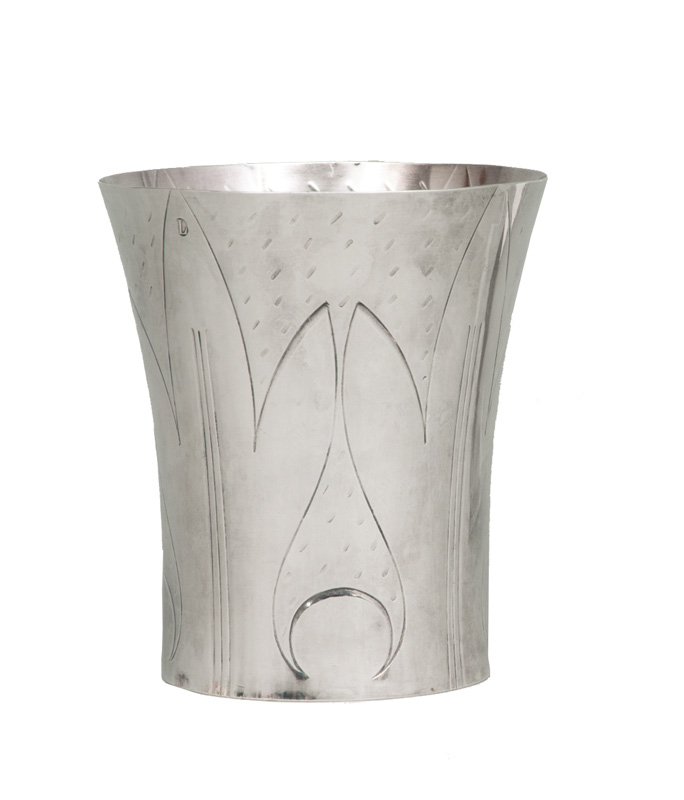 A beaker with stylized foliage pattern