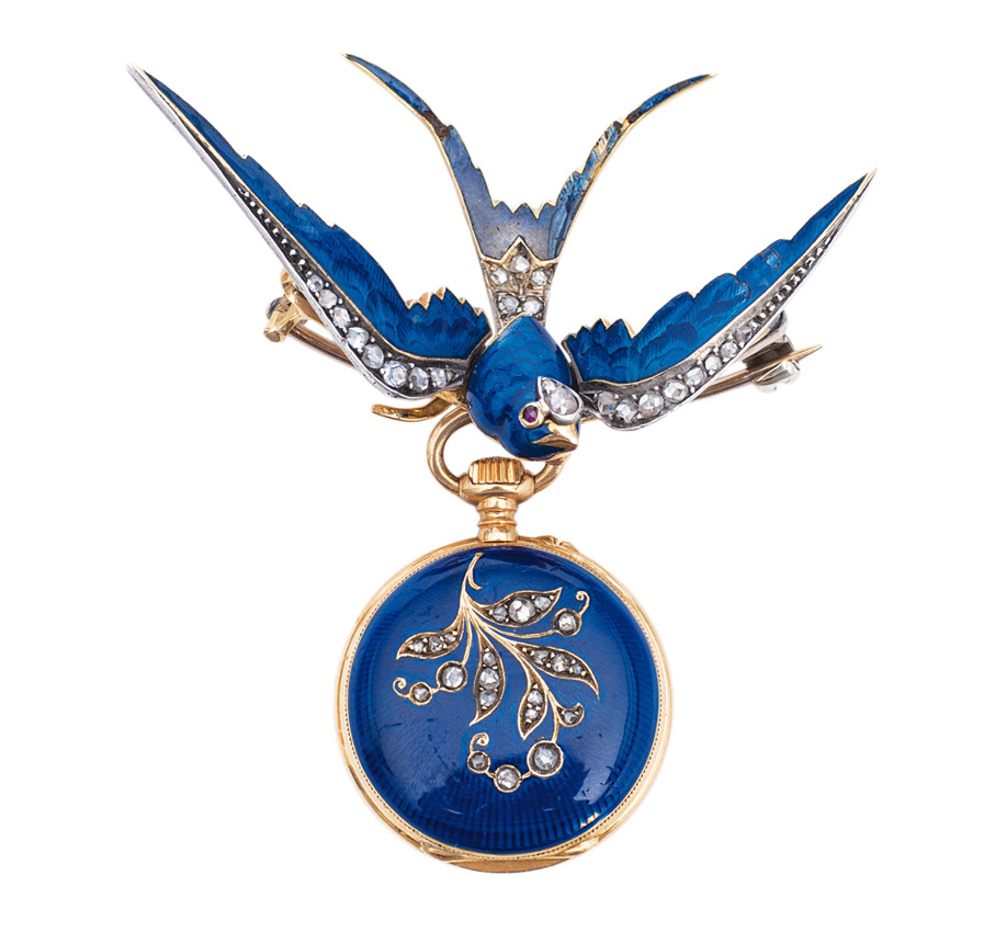 An Art Nouveau watch brooch with enamel and diamonds