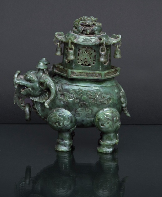 A rare and exquisite spinach green jade censer in the shape of a mythical beast