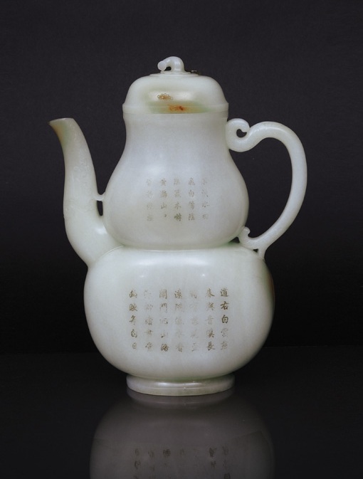 A fine and rare white jade 'double-gourd' ewer with poem inscription