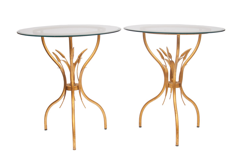 A pair of modern occasional tables with decor of ear of corn