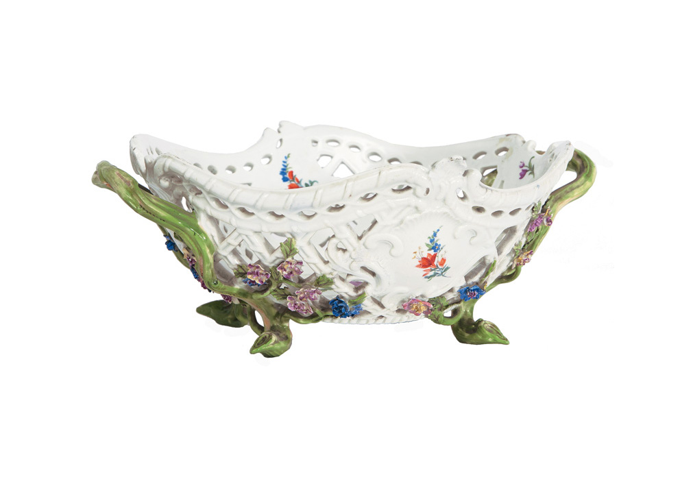 An fretwork basket with flower decoration
