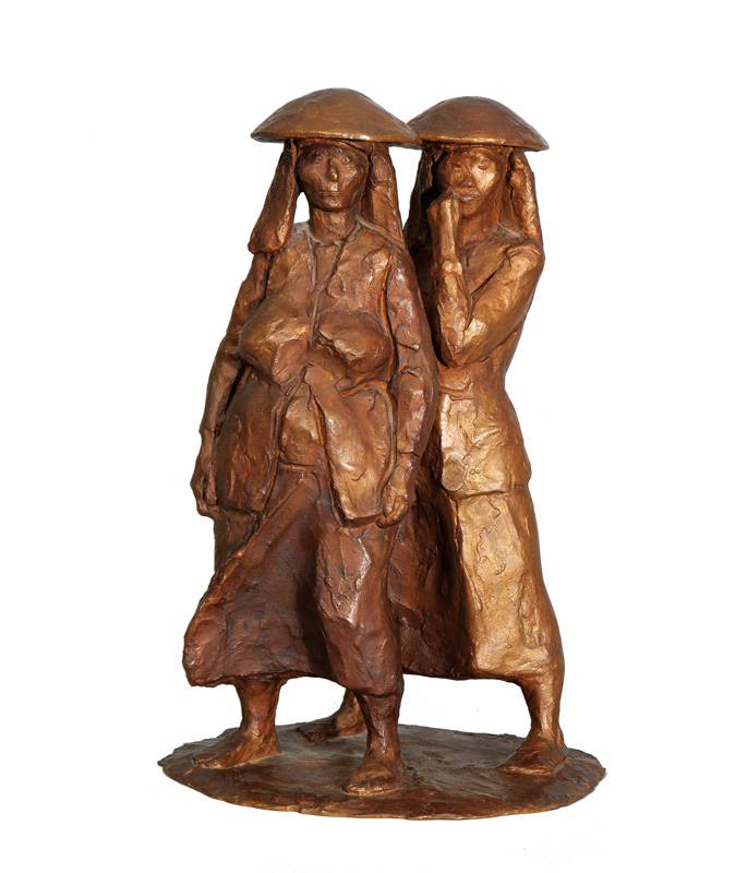 A bronze figure 'Rice planters'