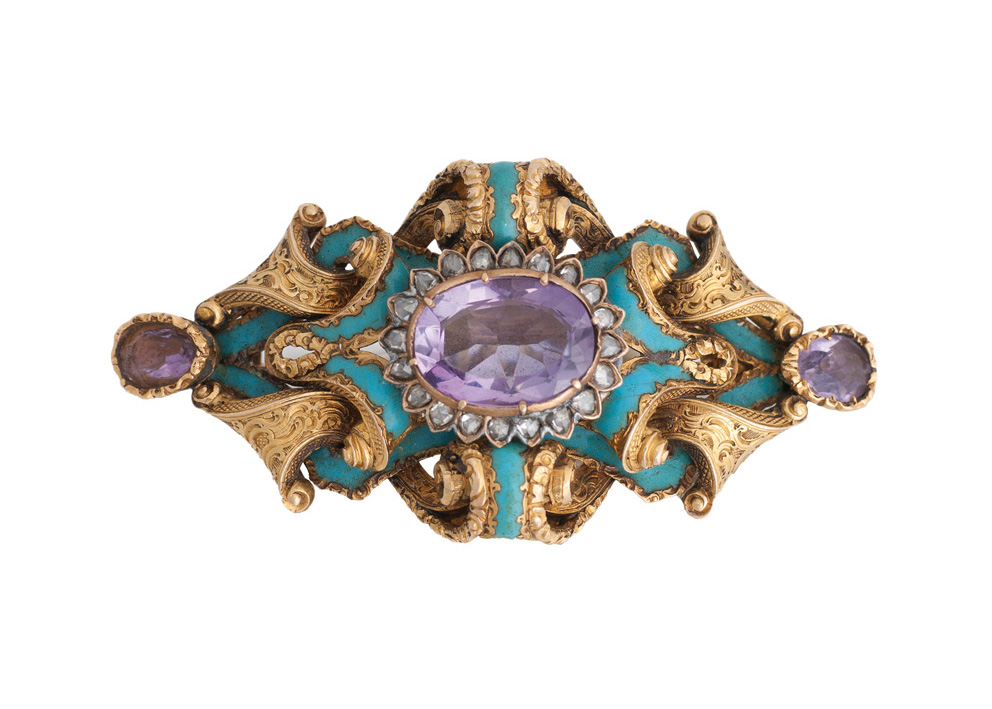 An antique turquoise amethyst brooch with rose cut diamonds