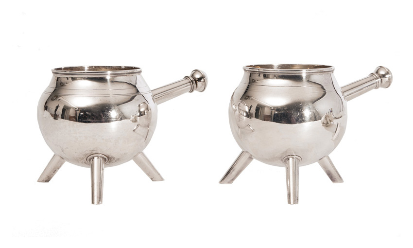 A pair of modern saucepans