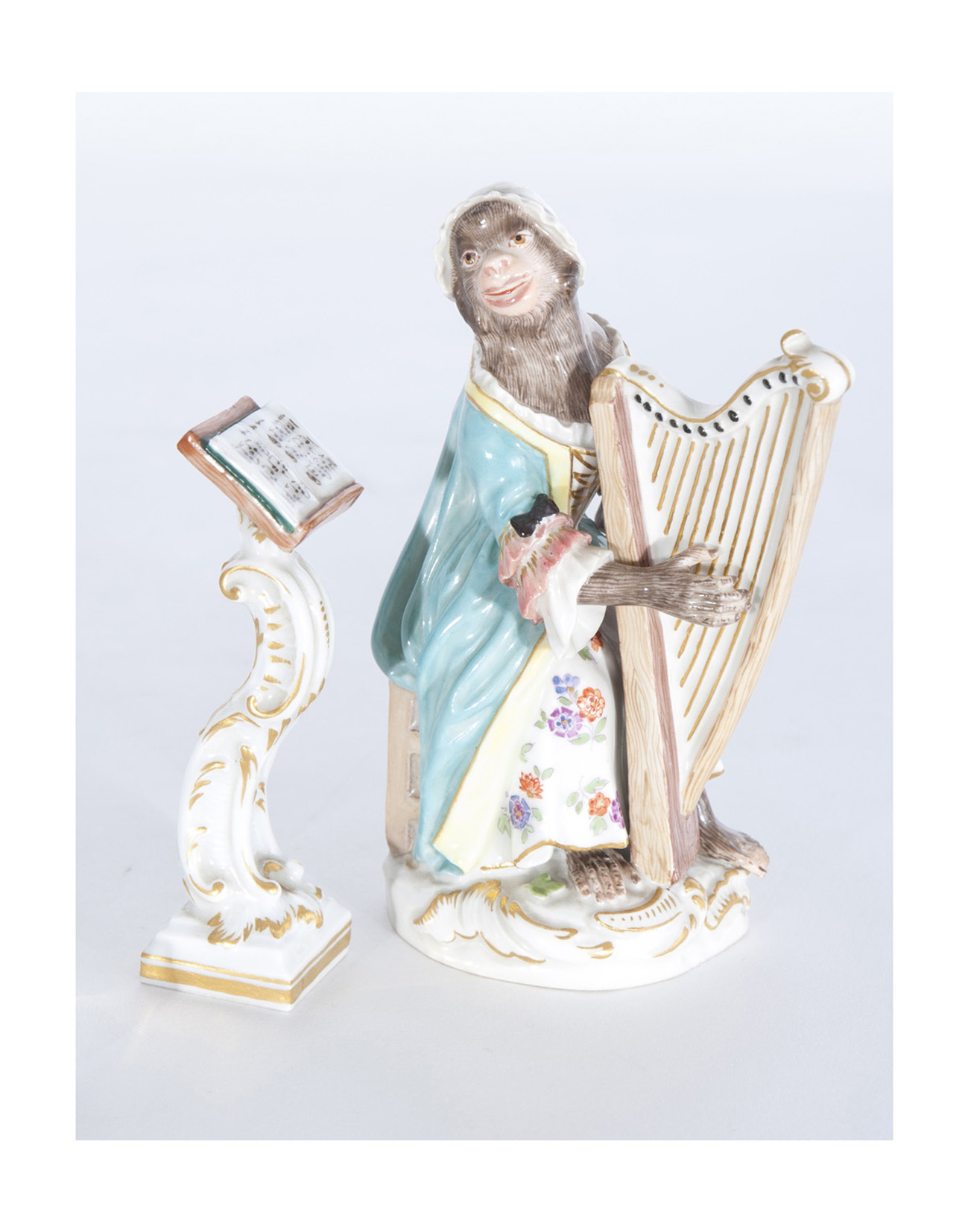 A figure 'Harpist'