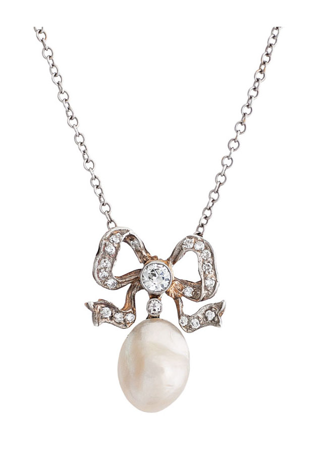 An Art-Nouveau natural pearl pendant with diamonds