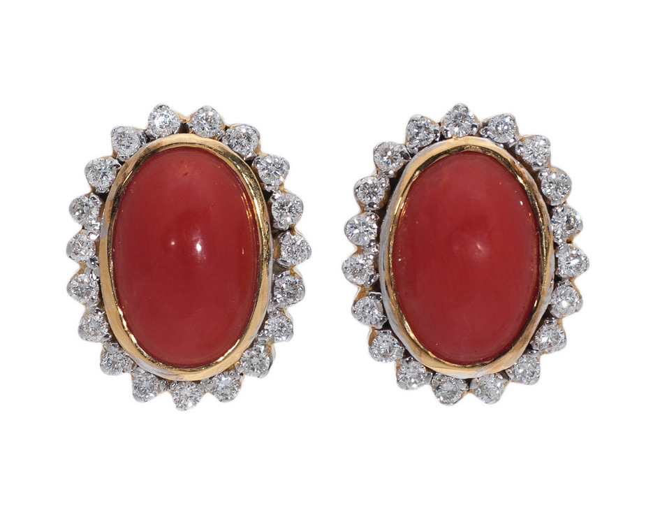 A pair of coral diamond earstuds