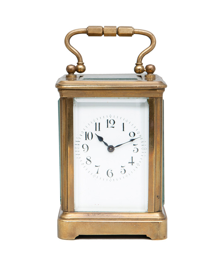 A french alarm clock with etui