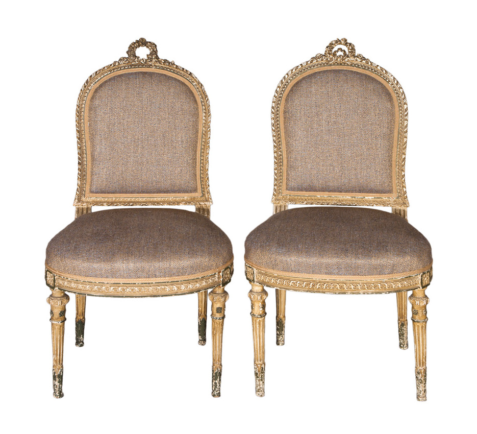 A pair of chairs of Louis Seize style