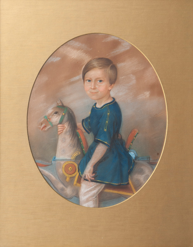 Portrait of a Boy on a Rocking Horse