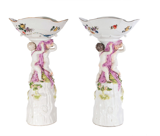 A pair of exceptional centrepieces with putti