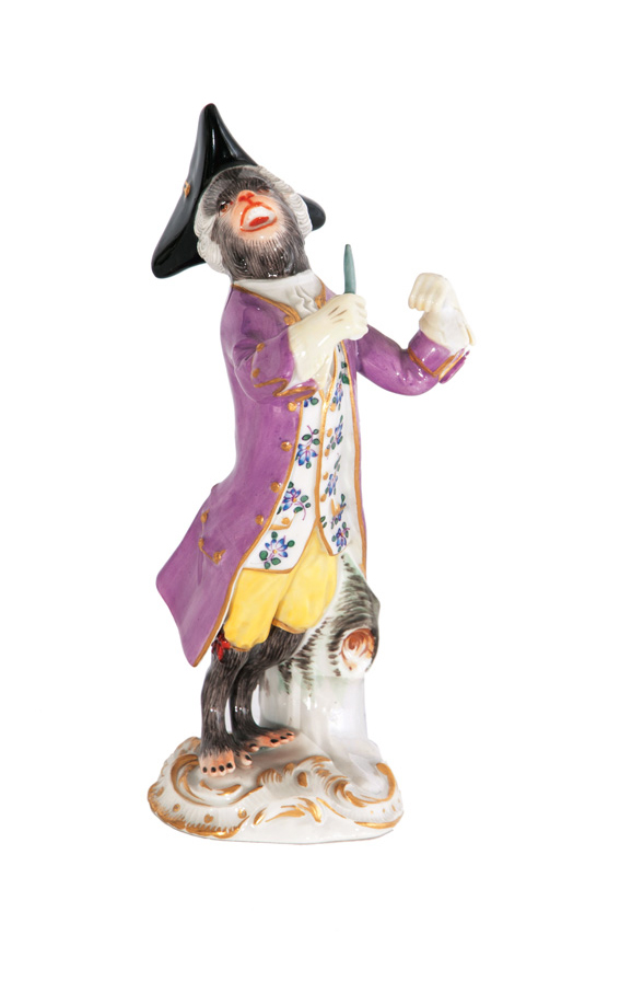 A figure 'Monkey with drumsticks'