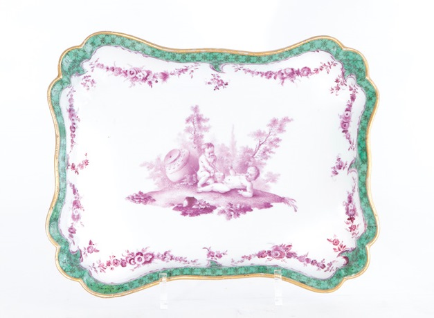 A quatrefoil bowl with 'purple camaieu' putti