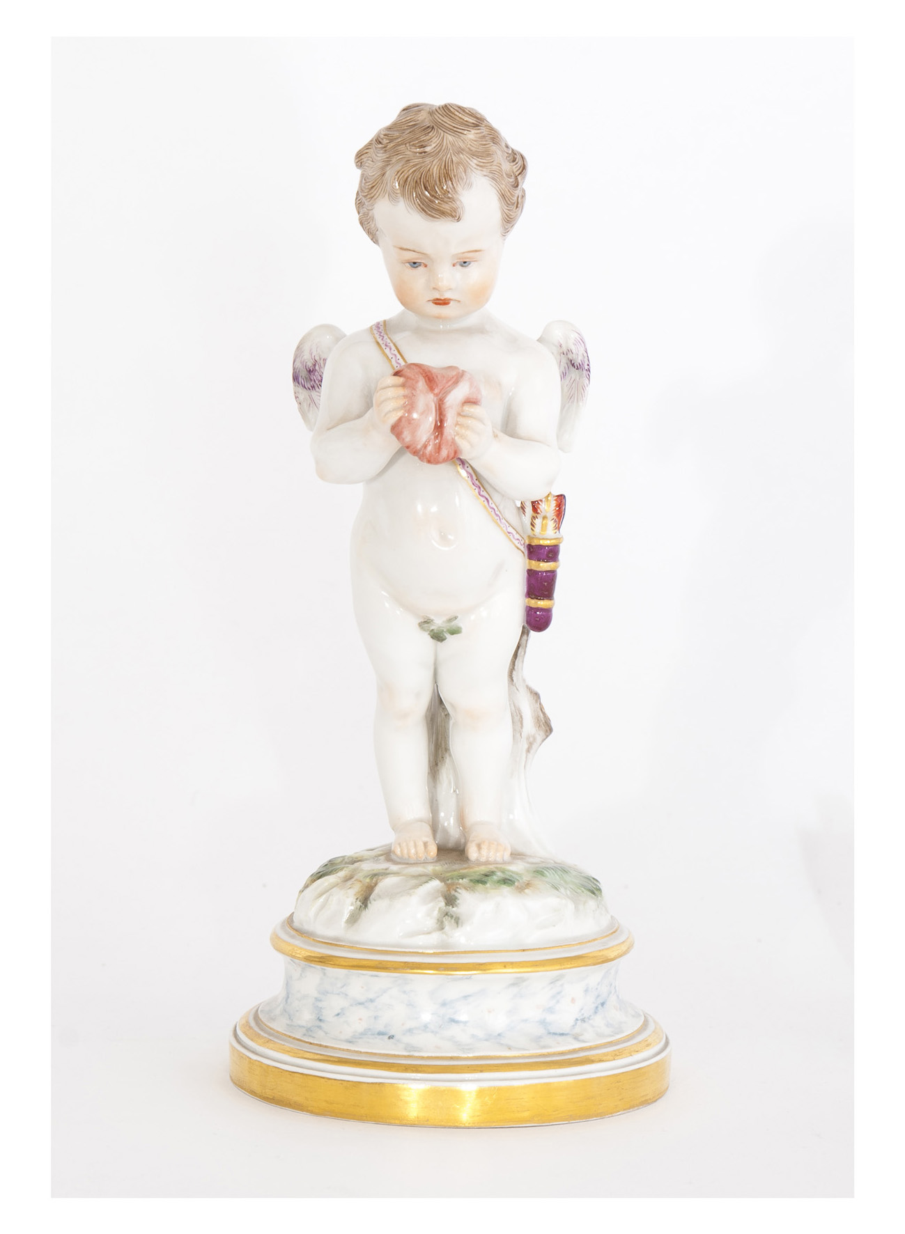 A figure 'Ashamed cupid holding a broken heart'