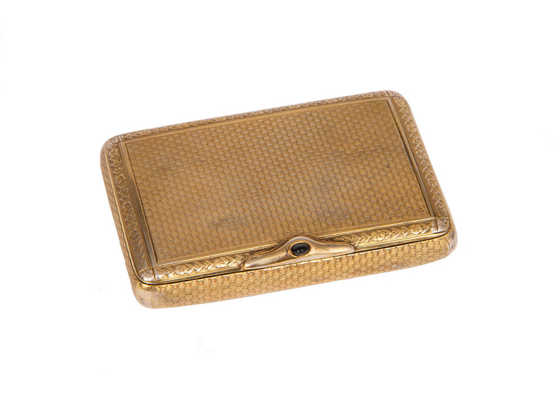 A gilded cigarette case