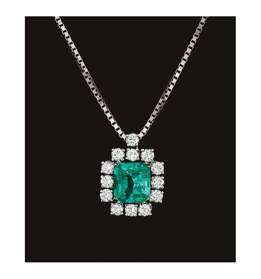 A emerald diamond pendant with necklace