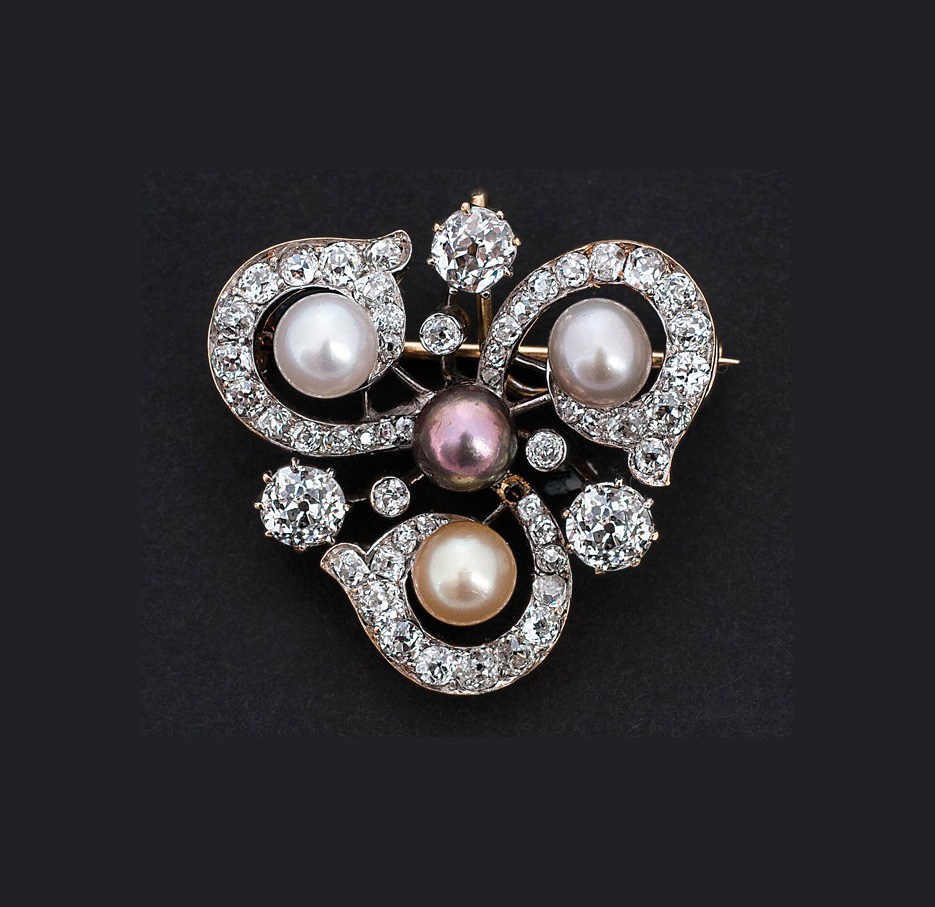 An Art Nouveau diamond pearl brooch