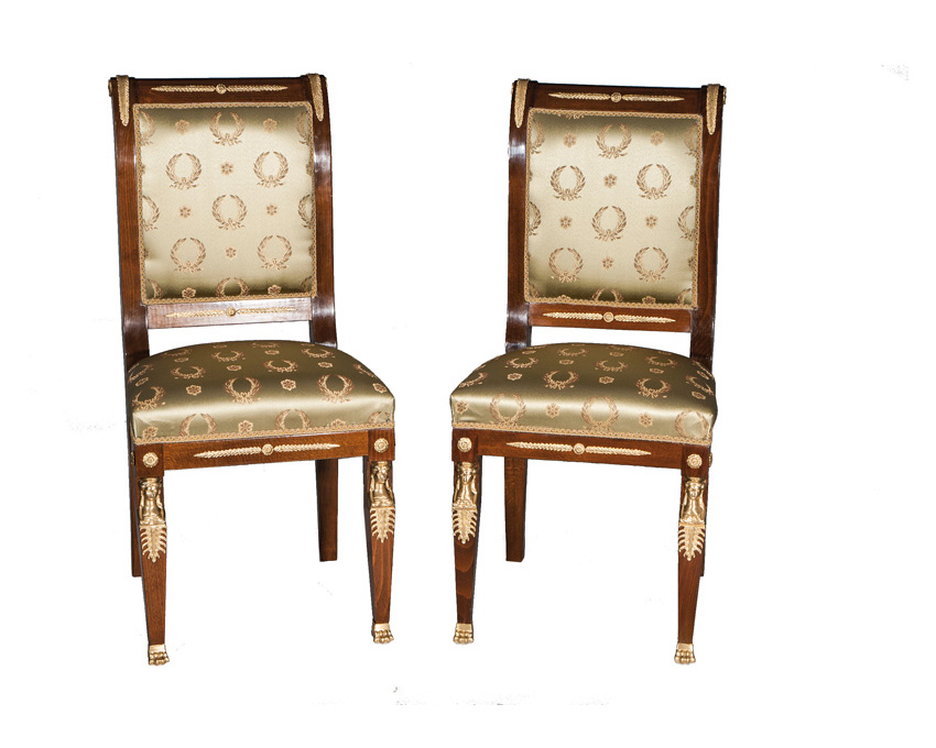 A pair of chairs of Empire style