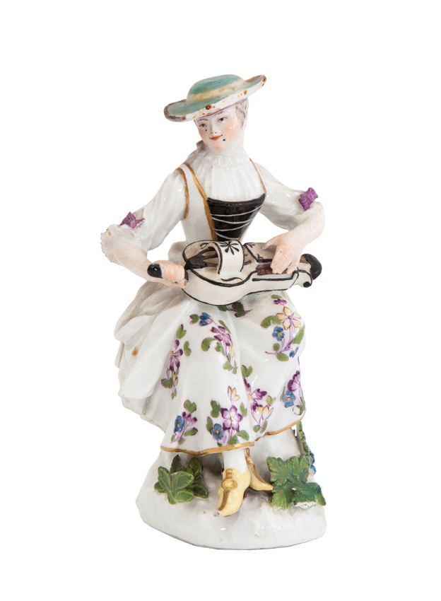 A rare figurine 'Hurdy-gurdy woman (Tyrolean)'