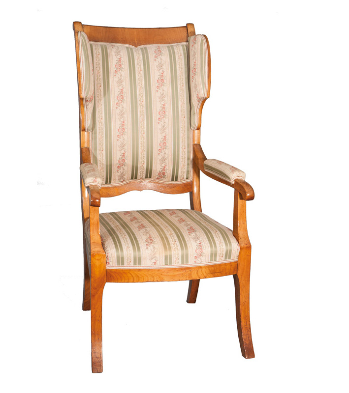 A Biedermeier wing back armchair