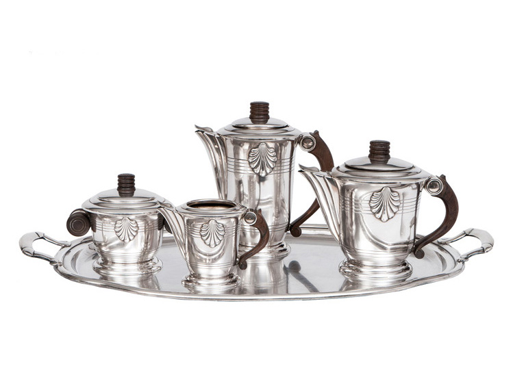 An Art Deco service with shell ornaments