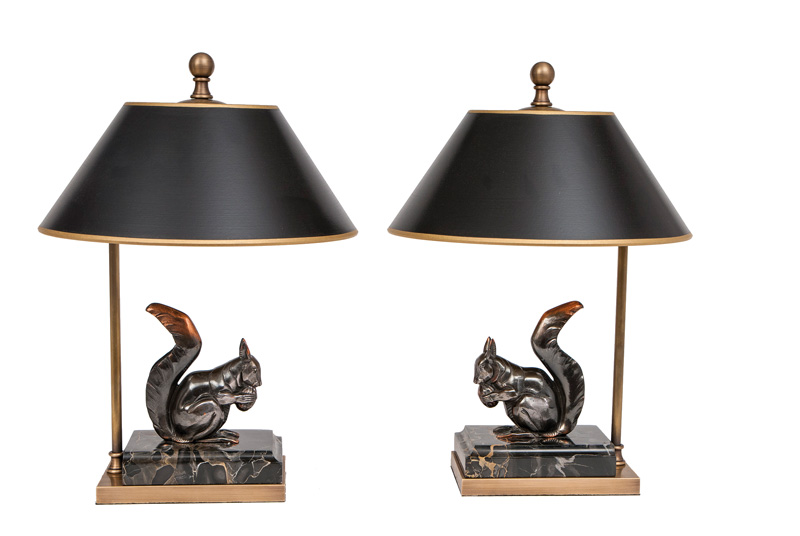 A pair of Art Deco table lamps with squirrel figures
