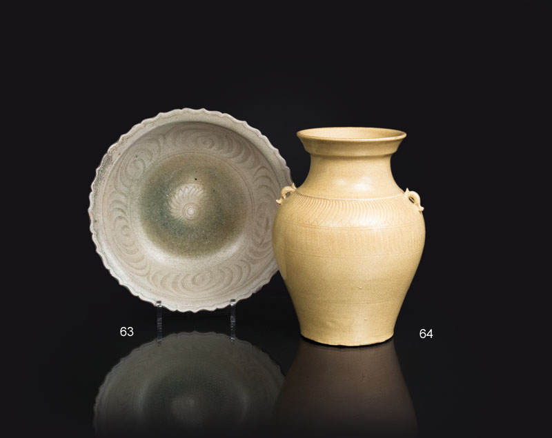 A celadon bowl with floral decoration