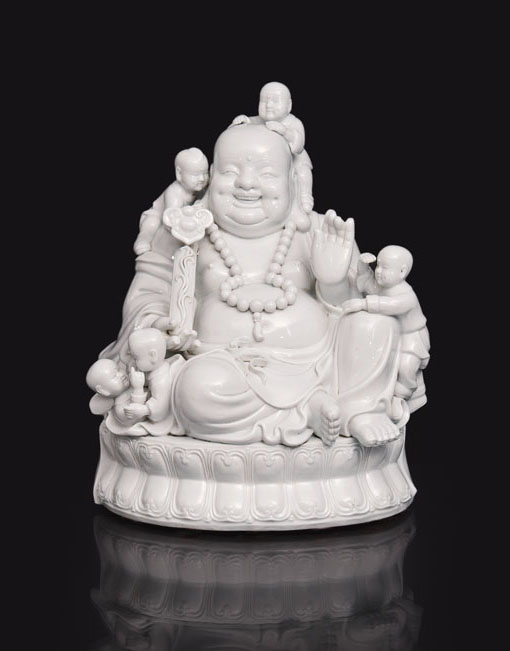 A Dehua figure 'Budai with children' 布袋