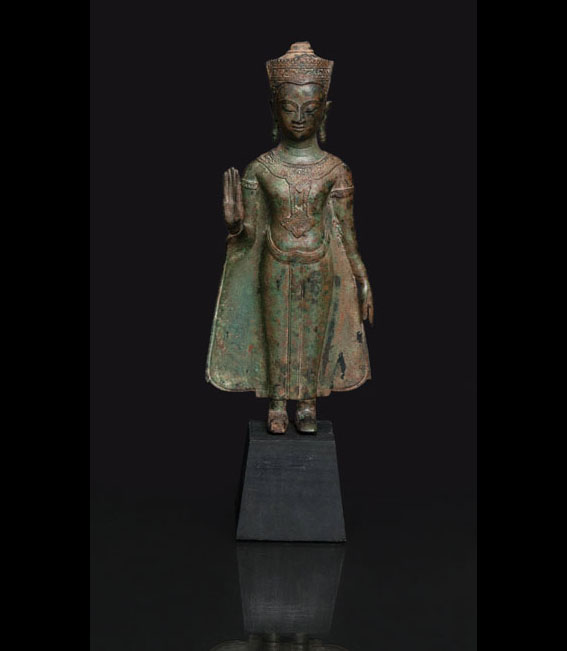 A bronze standing buddha