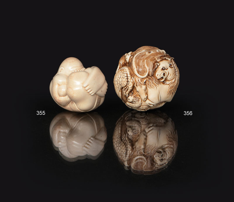 An unusual ivory ball with zodiacs