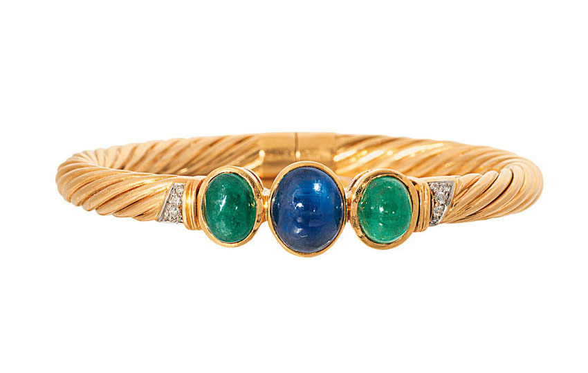 A sapphire emerald bangle bracelet with matching ring