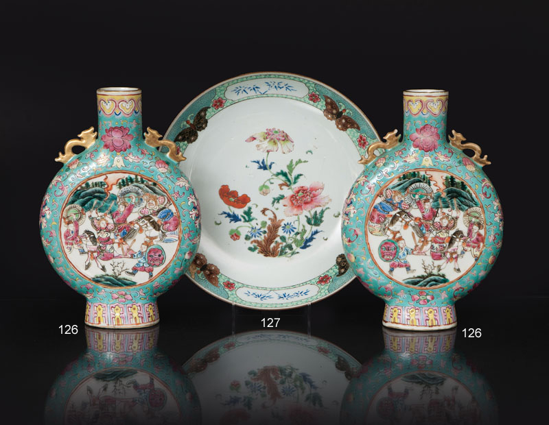 A pair of 'Famille Verte' moonflasks with battle scenes and phoenix birds