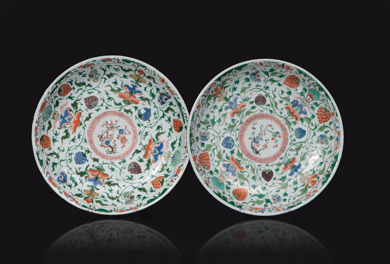 - A pair of large 'Famille-Verte' plates with sumptuous foliage decoration A pair of large 'Famille-Verte' plates with sumptuous foliage decoration