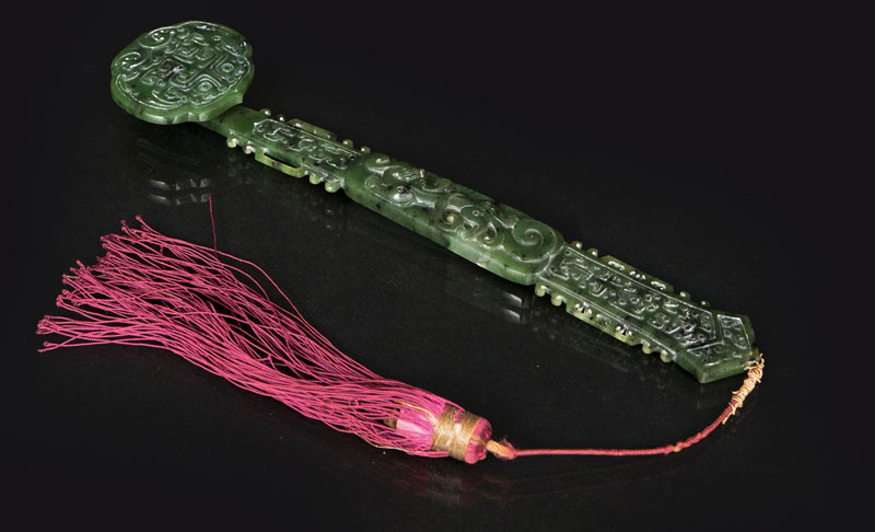 A rare spinach green jade sceptre 'Ruyi'