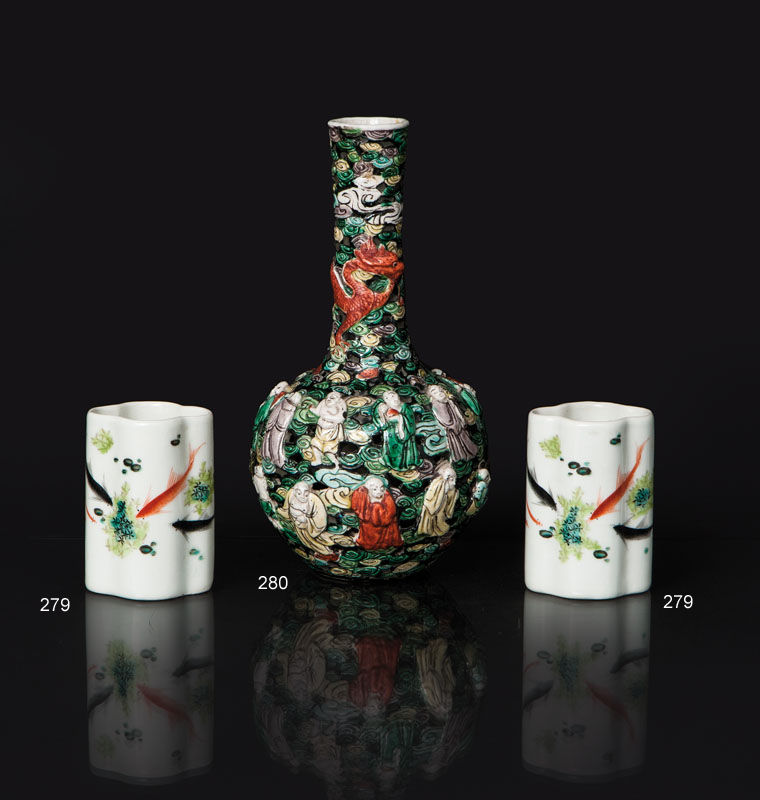 A pair of quatrefoil brushpots with fishes